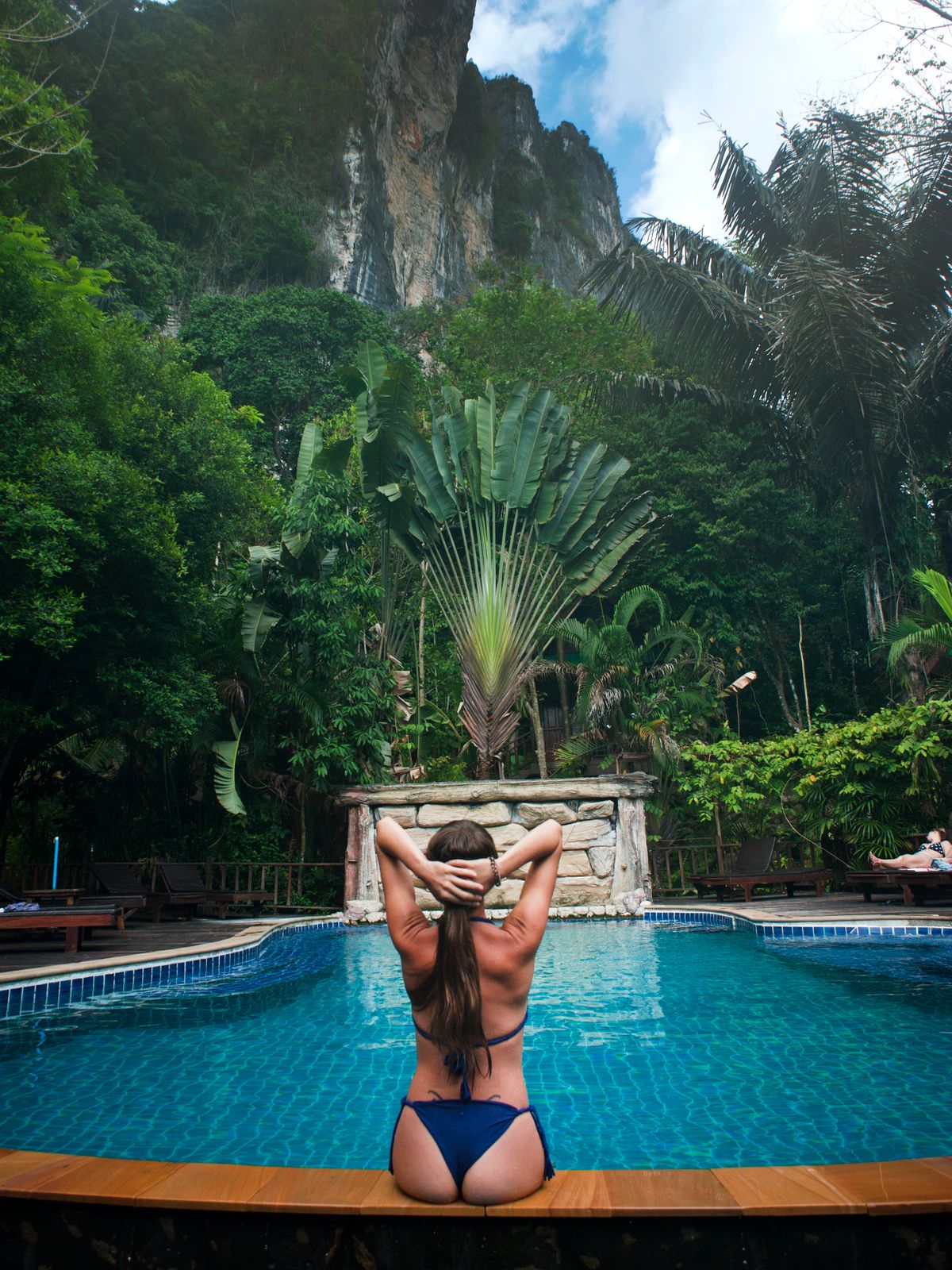 Poolside relaxation at a tropical resort