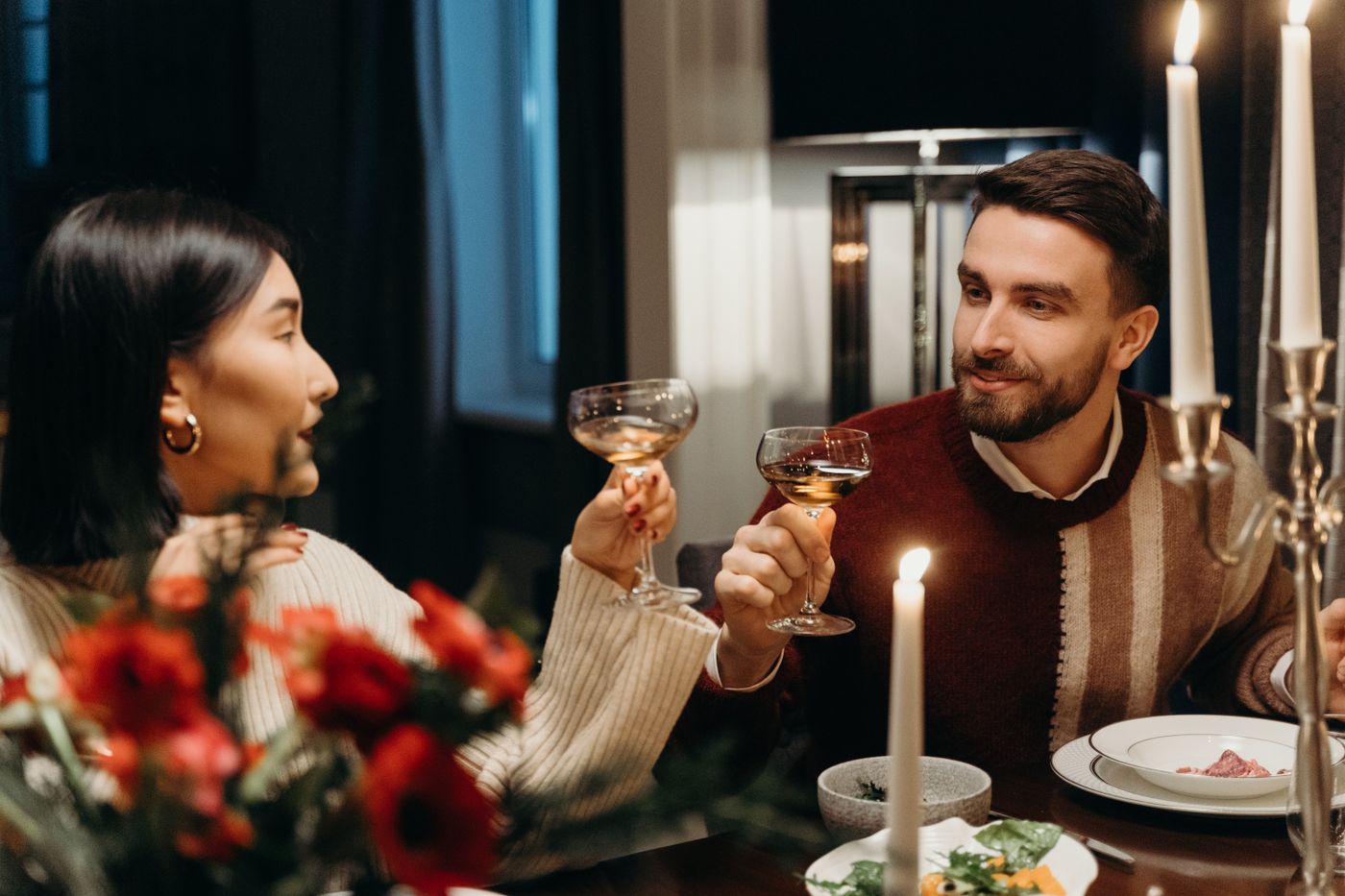 Couple enjoying a romantic candlelit dinner