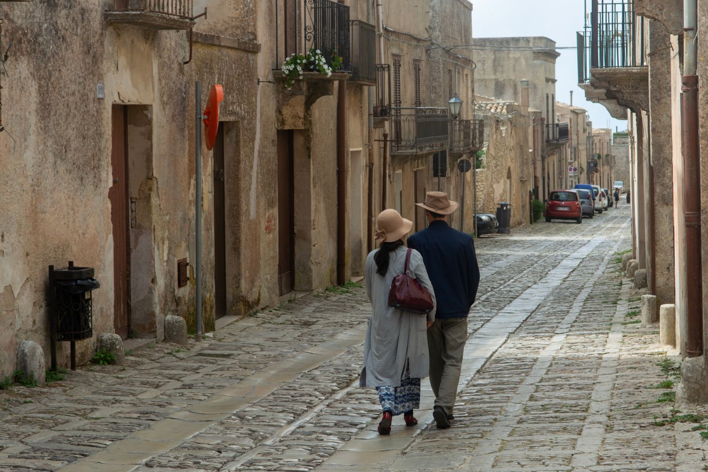 Couple strolling a historic hilltop village
