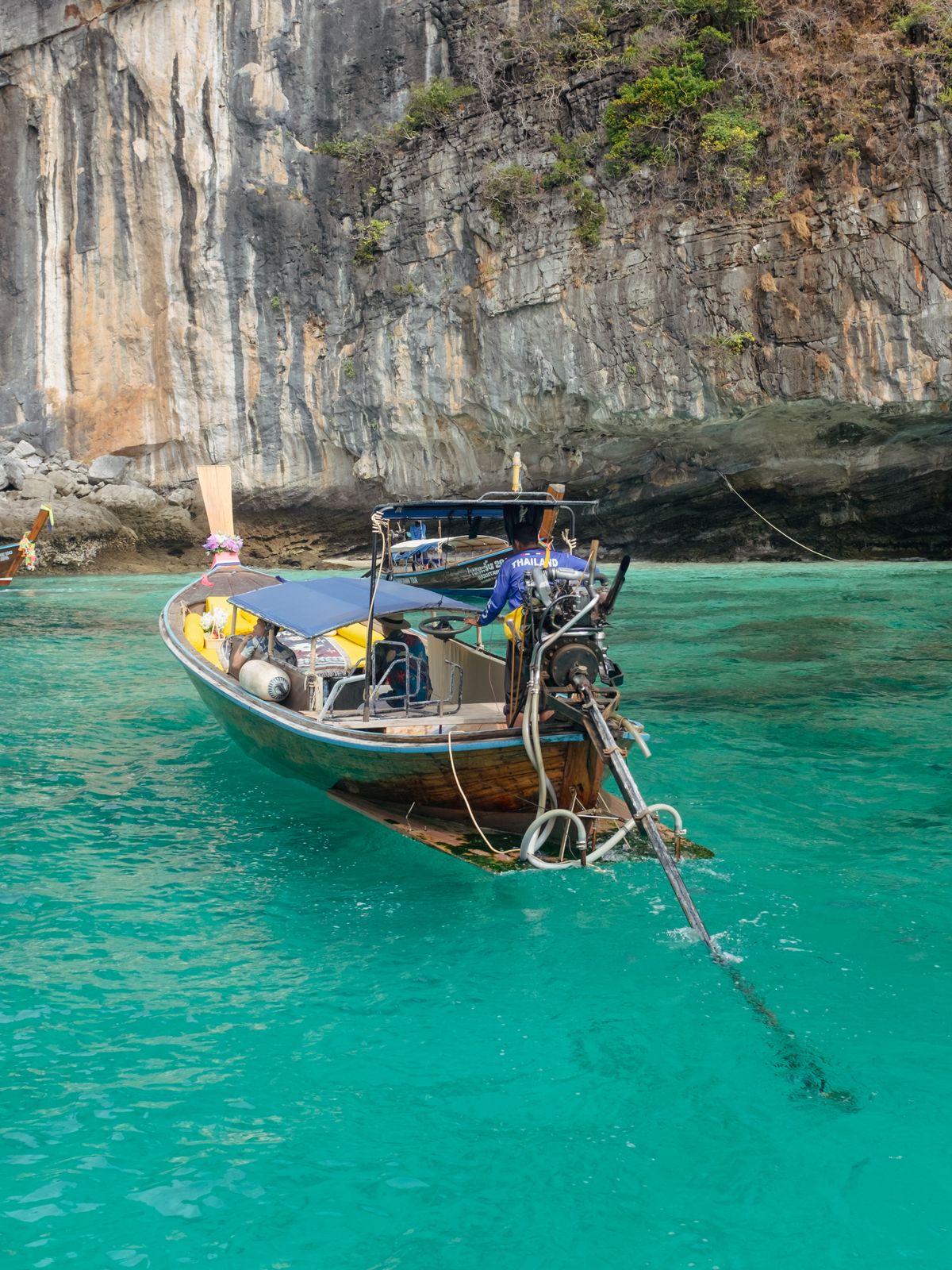 Traditional longtail boat on turquoise Andaman water
