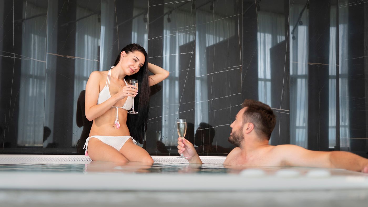 Couple relaxing in a hotel jacuzzi