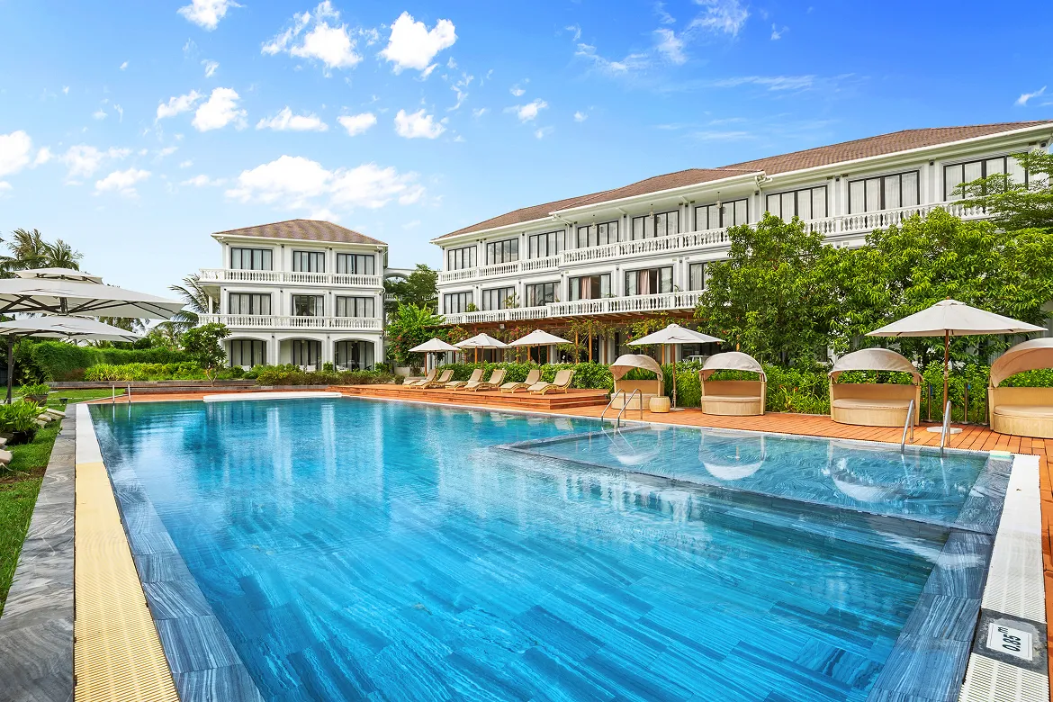 Infinity pool overlooking the river at Karma Duyên